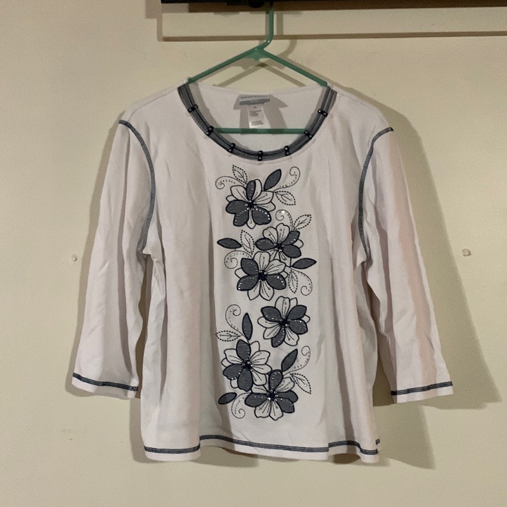 Blue and white slightly worn loose top